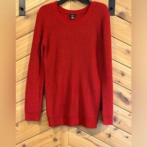 Women’s long sleeve sweater. Red with glitter inlay.